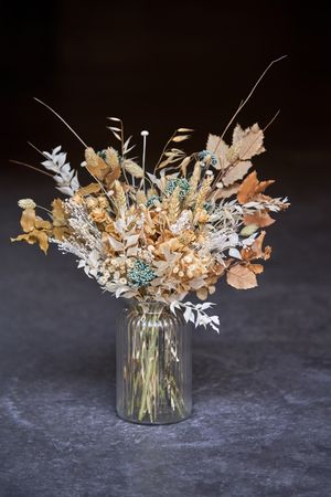 Bouquet of dried flowers in jar