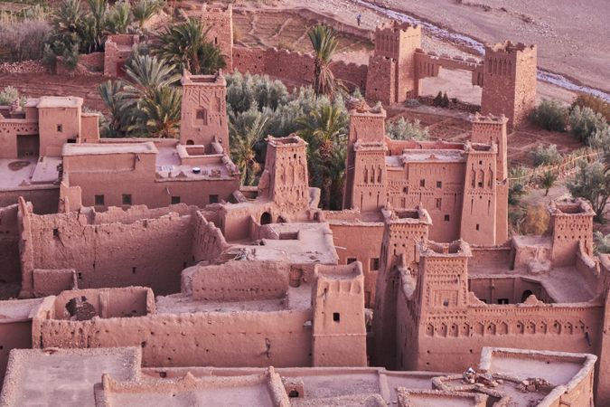 Ancient city near river in desert and wonderful sky
