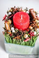 Top view of red Christmas candles and spice decor in vase 0PKvrb