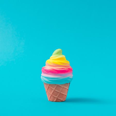 Colorful ice cream on bright blue background
