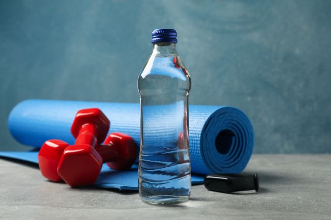 Yoga mat, weights and water bottle
