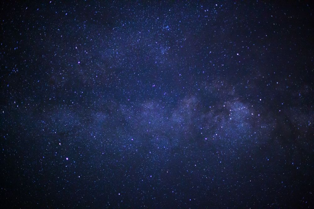 milky way galaxy with cloud and space dust in the universe, Long exposure photograph, with grain.