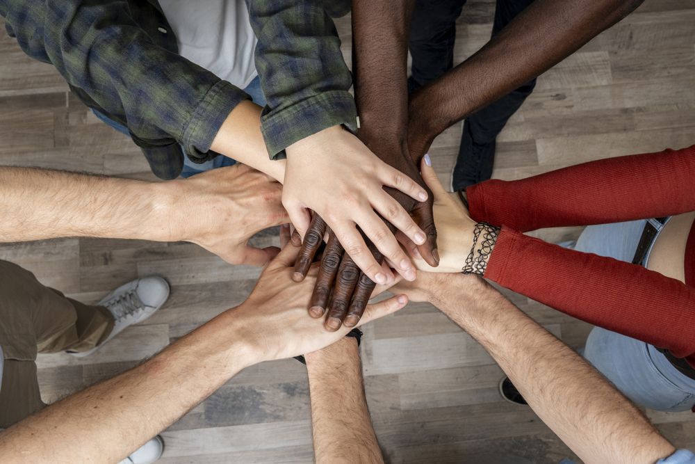 Teamwork unity support friendship collaboration hands together