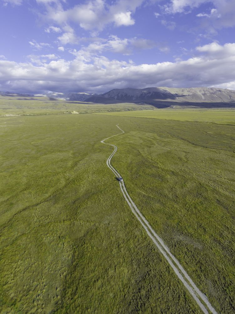 Drone shot of dirt road in the countryside