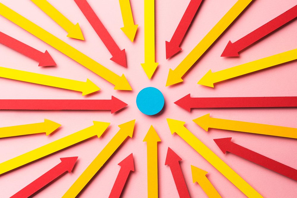 Arrows pointed at a blue dot in the center