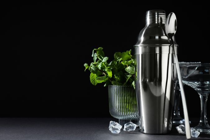 Concept of preparing cocktail, shaker, space for text