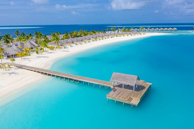 Idyllic pier on a beach resort in the Maldives, landscape