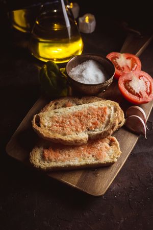 Spices and vegetables near toasts