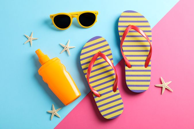 Summer vacation composition on two tone background. Top view, closeup