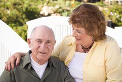 Happy Mature Couple Relaxing in The Park