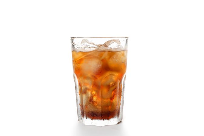 Glass of cold cola isolated on blank background