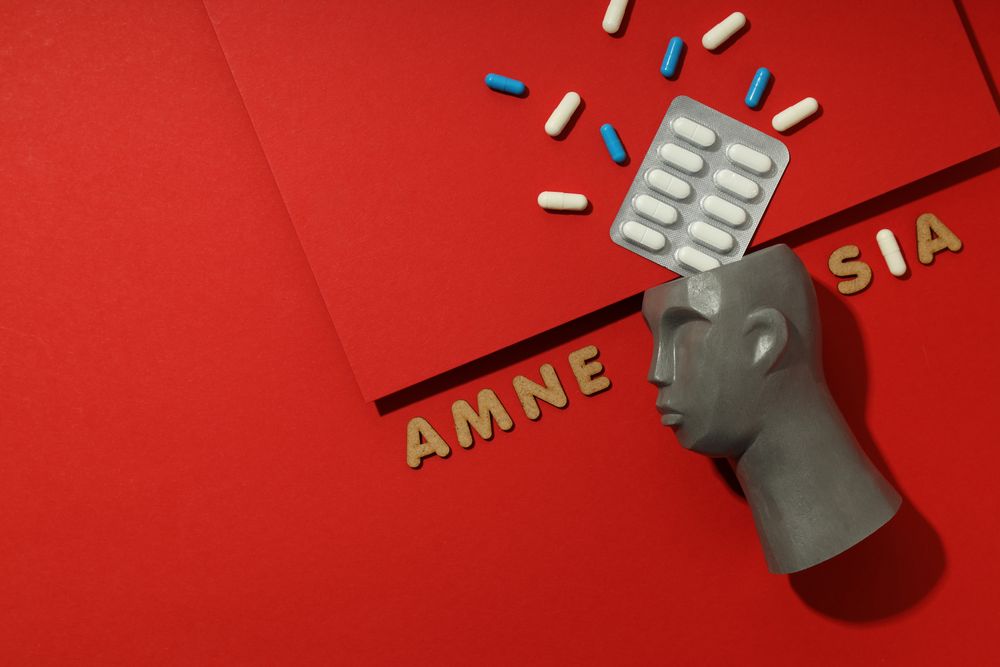 Bust with pills and the words “Amnesia” with space for text