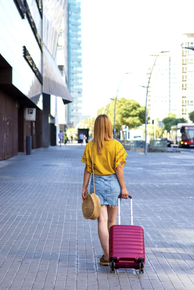 Young woman traveler going on holiday