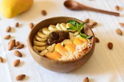 Bowl with delicious healthy snacks
