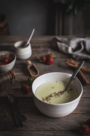 Strawberry porridge in bowl on table