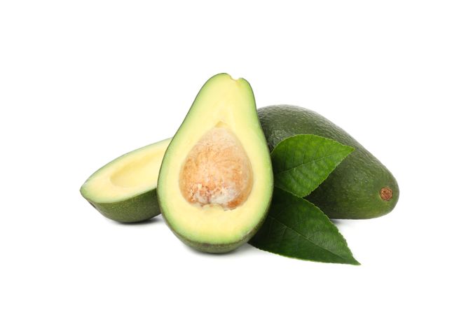 Ripe fresh avocado isolated on plain background