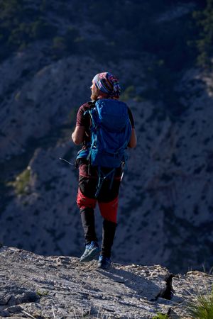 Back view of traveler in highlands