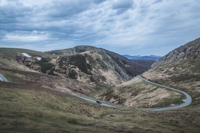 Winding road on hilly terrain
