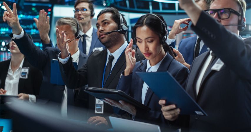 Portrait of Professional Traders Working on a Stock Exchange.