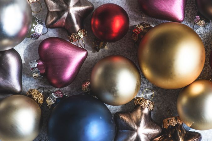 Close up of colorful Christmas baubles on table