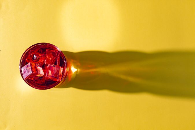 Glass with cold red beverage