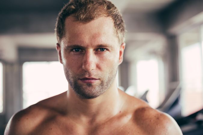 Portrait of white man in the gym looking serious