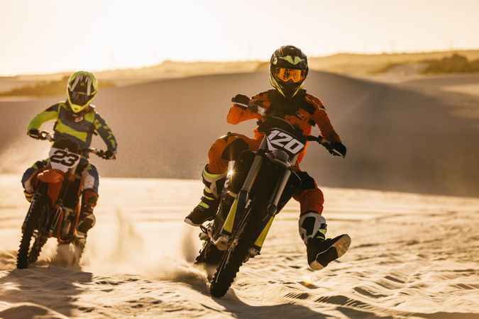 Riders racing in desert