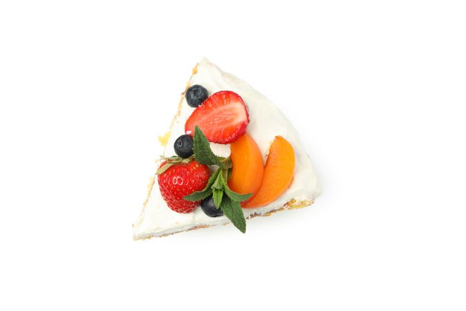 Piece of berry cream cake isolated on blank background