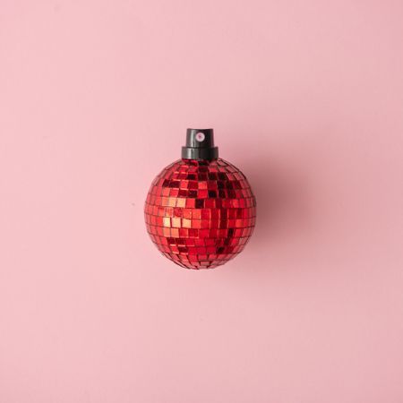 Red disco ball decoration with spray paint cap