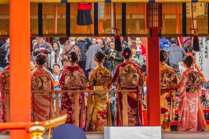 Women in kimonos standing on stage
