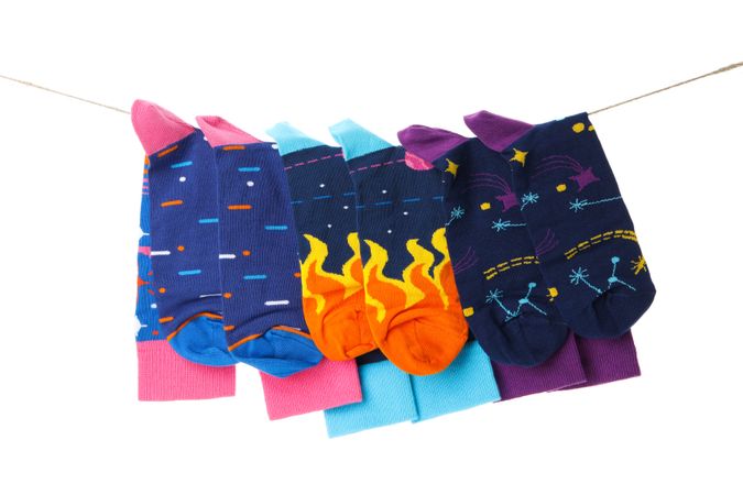 Concept of clothes for legs - socks, isolated on light background