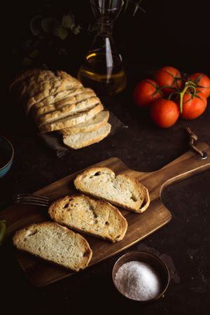 Toasts ingredients on dark table