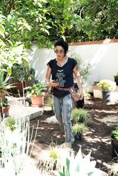Woman holding shears while working in the garden