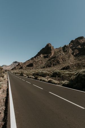 Road in desert to hills