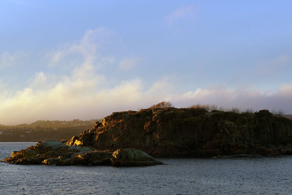Peaceful seashore lake at sunset