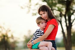 Affectionate mom with son outdoor