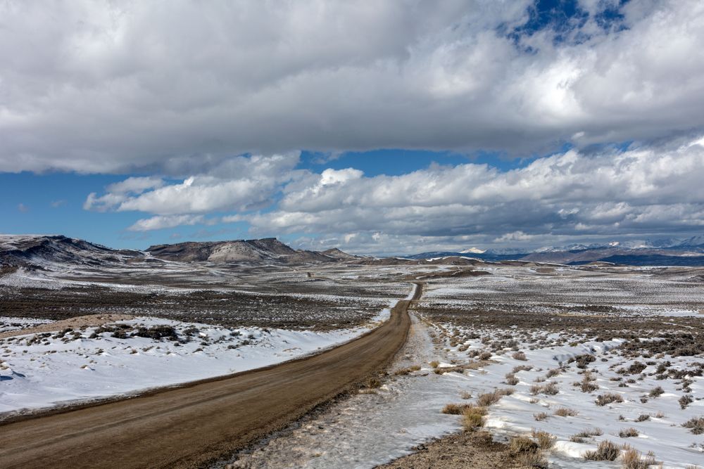 Remote road in wintertime in rugged Sweetwater County, Wyoming
