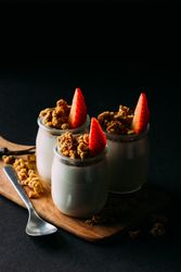 Glass bottles with milk and walnuts