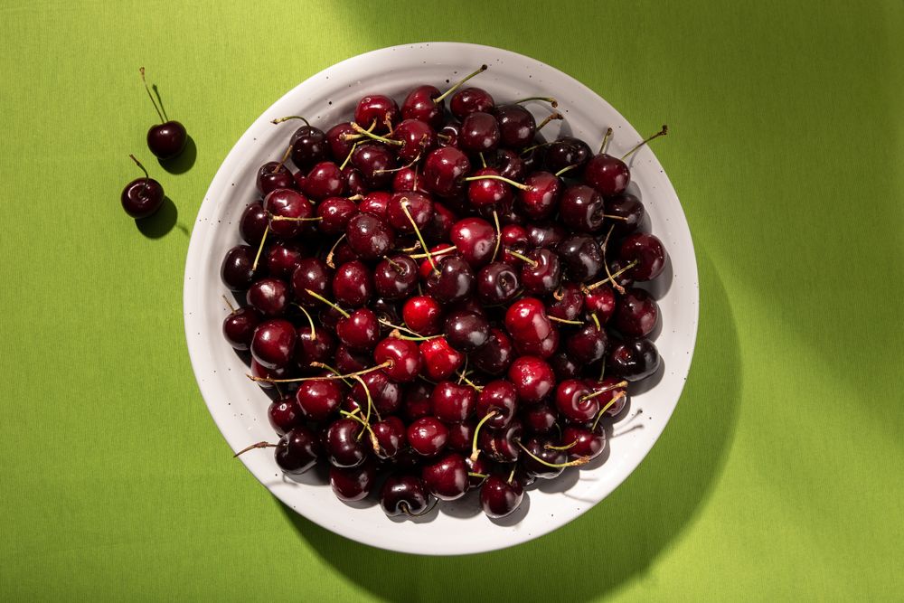 Fresh sweet cherries in bowl