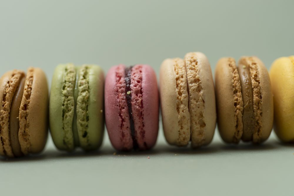 Colorful macaroons lined up on a table