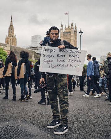 London, England, United Kingdom - June 6th, 2020: Man holding sign at BLM protest in Westminster