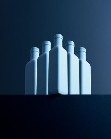 Bottles over dark background
