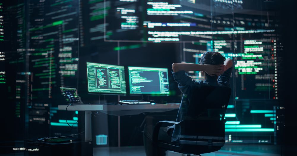 Female Developer Happily Resting After Successfully Typing on Computer a Functioning Back-end Code.