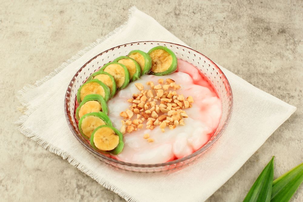 Glass bowl of es pisang ijo, Indonesian dessert