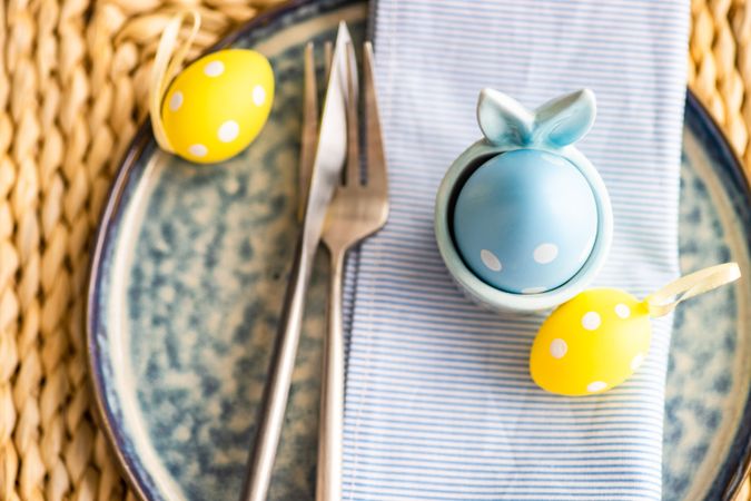 Easter holiday concept with dotted Easter eggs decorating a table setting