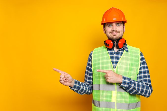 Young man civil engineer in safety hat