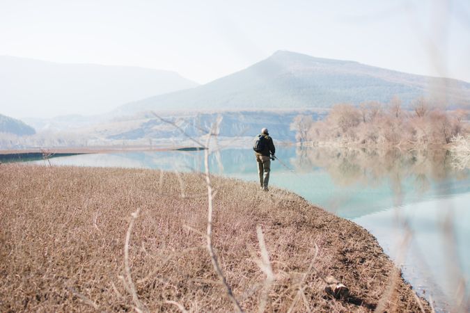 Man fishing near lake