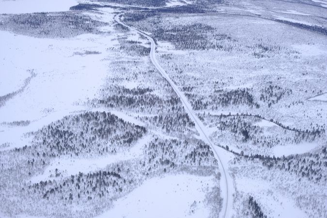Winding road in winter countryside