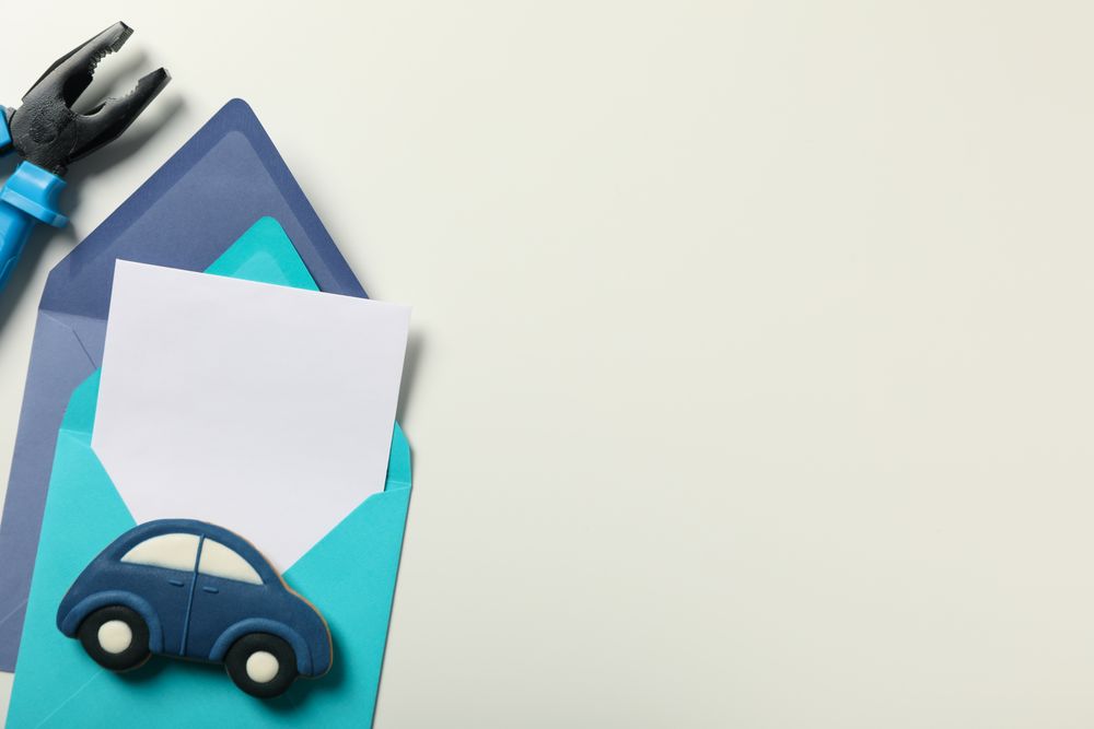 The concept of a gift for father's day, on a plain background.
