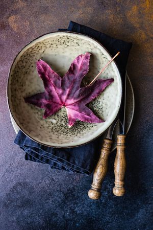 Table setting with grape leaf